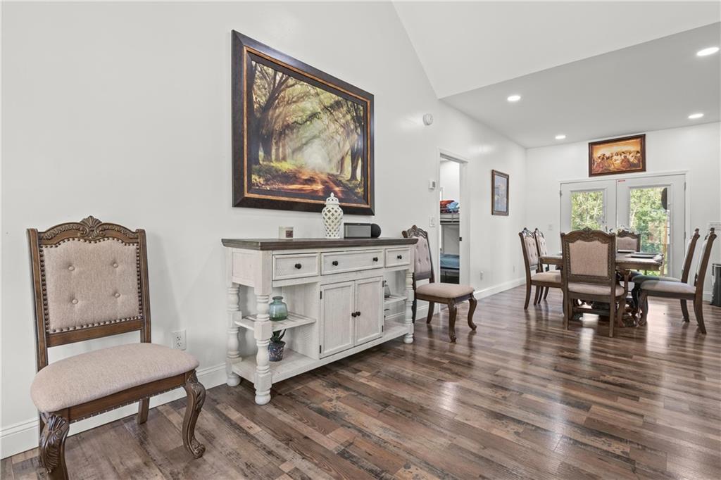 1175 Burwell Mt Zion Road Carrollton, GA 30117 - Photo 7 of 29 a living room with furniture and wooden floor