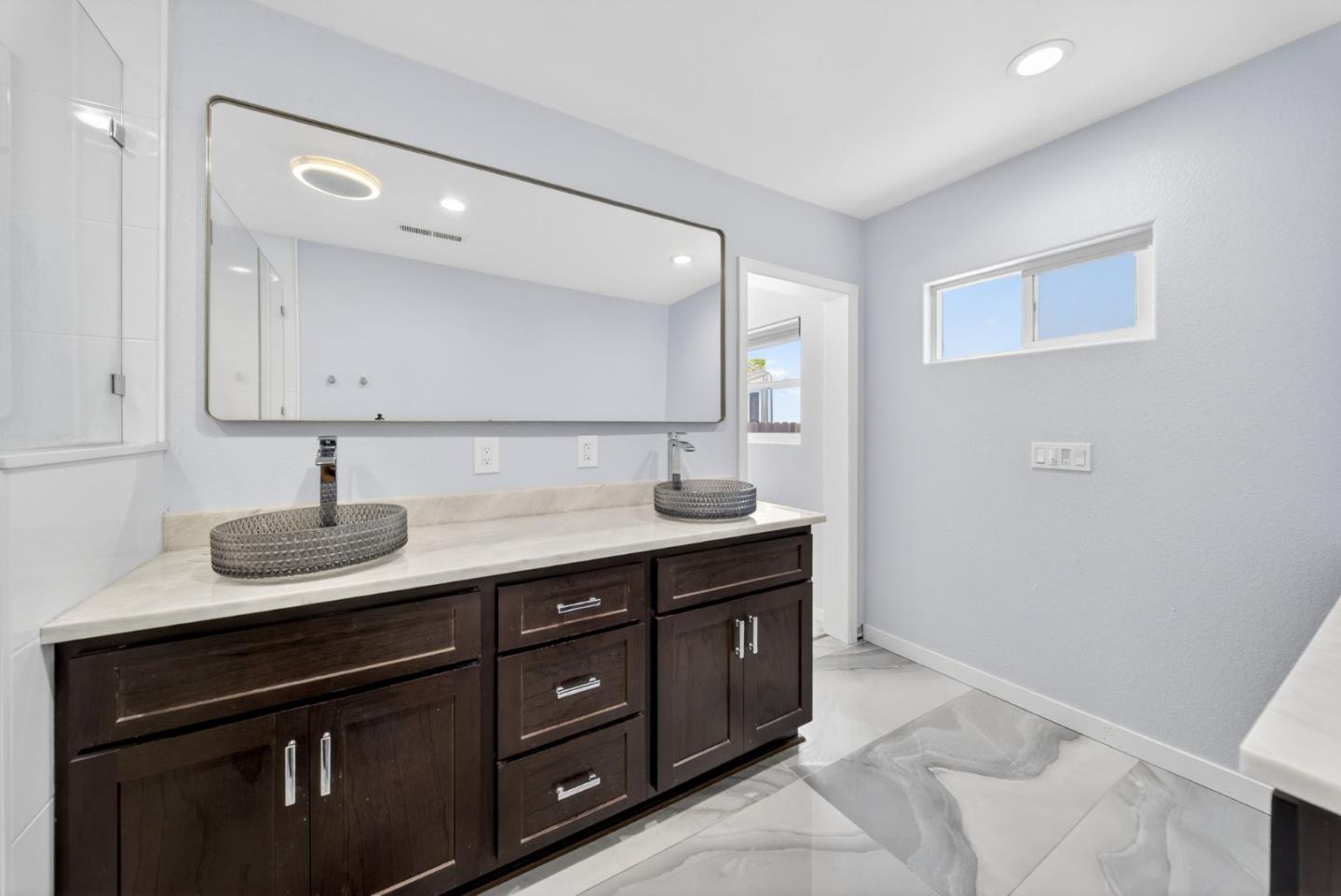 919 Old Canyon Road Fremont, CA 94536 - Photo 20 of 55 a kitchen with a sink and cabinets