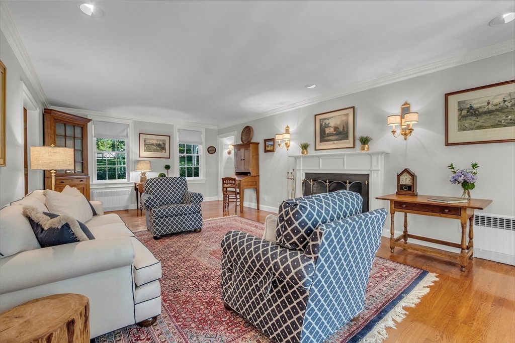 15 Rockridge Road Wellesley, MA 02481 - Photo 17 of 36 a living room with furniture and a fireplace