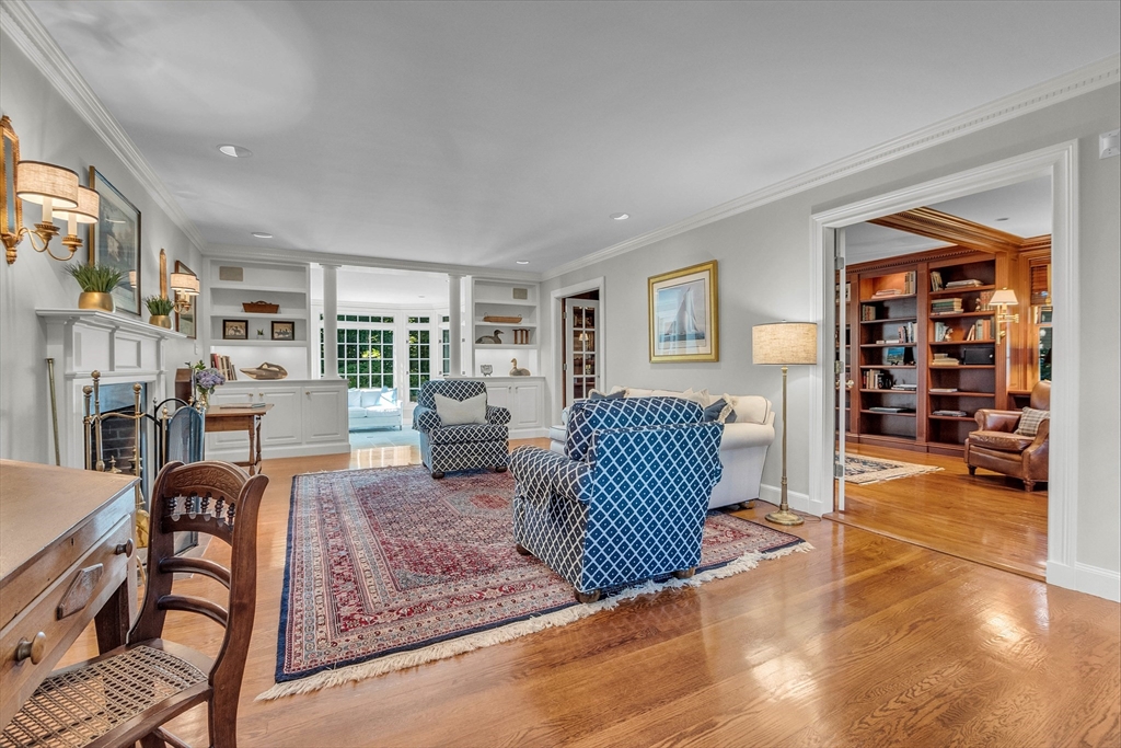 15 Rockridge Road Wellesley, MA 02481 - Photo 18 of 36 a living room with furniture and a dining table with rug kitchen