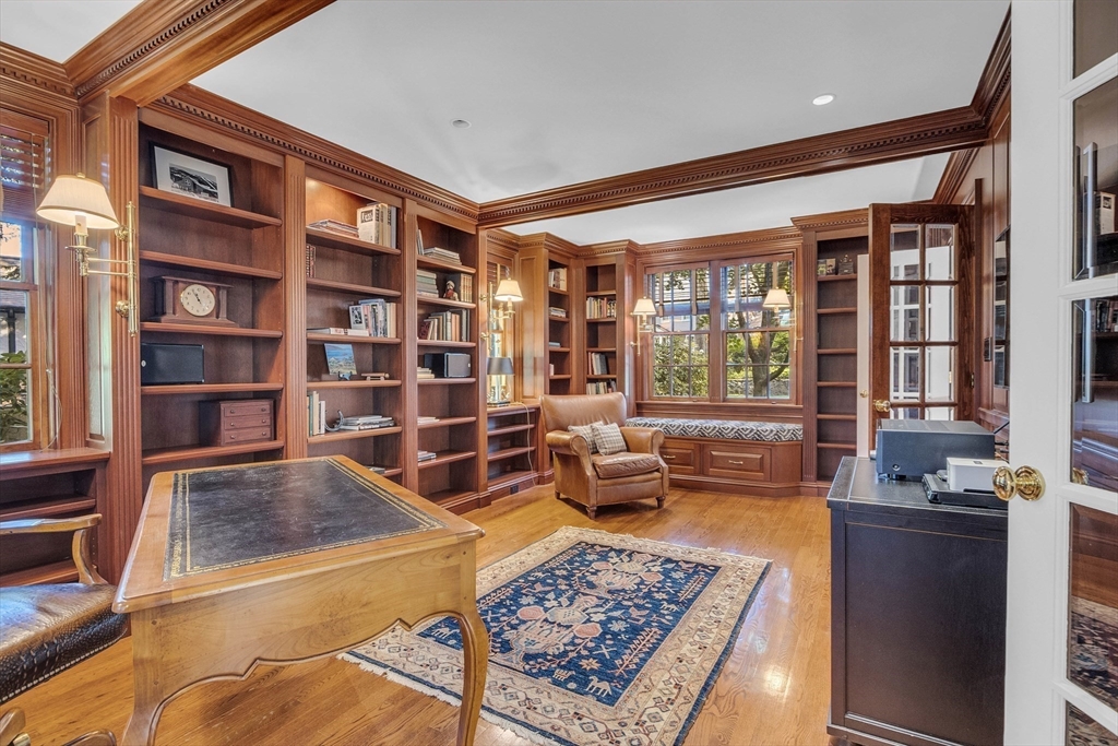 15 Rockridge Road Wellesley, MA 02481 - Photo 19 of 36 a living room with furniture and a book shelf