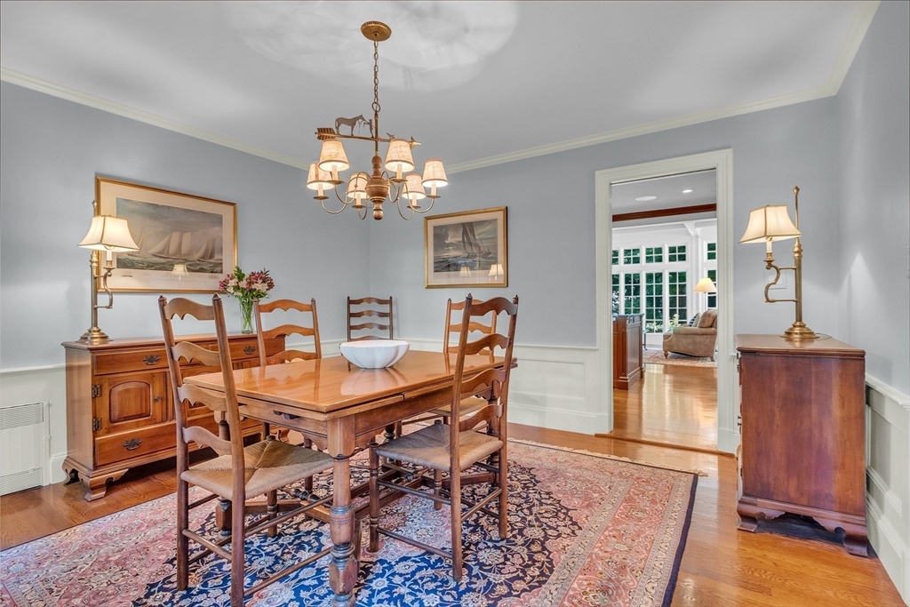 15 Rockridge Road Wellesley, MA 02481 - Photo 21 of 36 a view of a dining room with furniture wooden floor and chandelier
