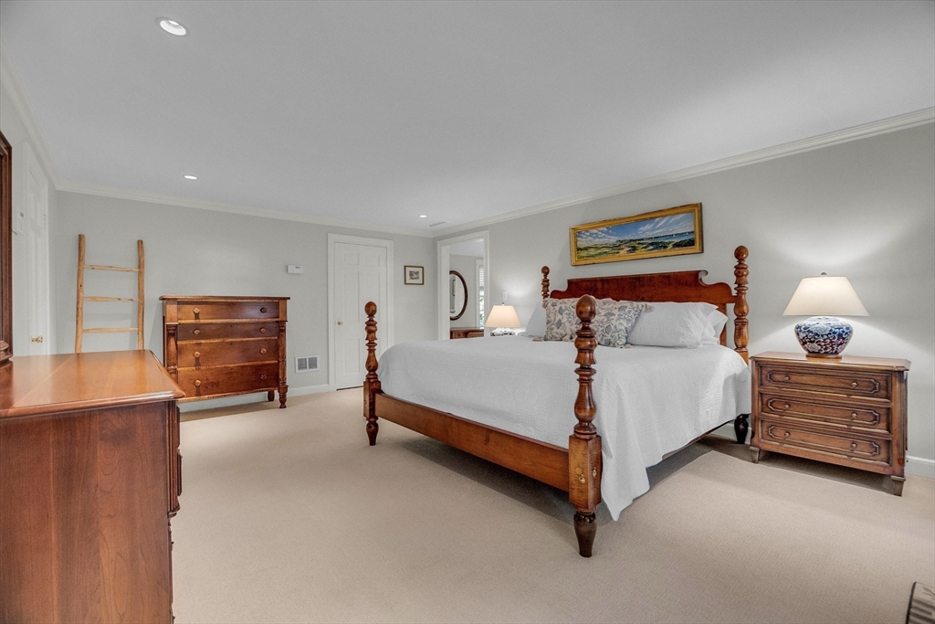 15 Rockridge Road Wellesley, MA 02481 - Photo 23 of 36 a bedroom with a bed and a couch