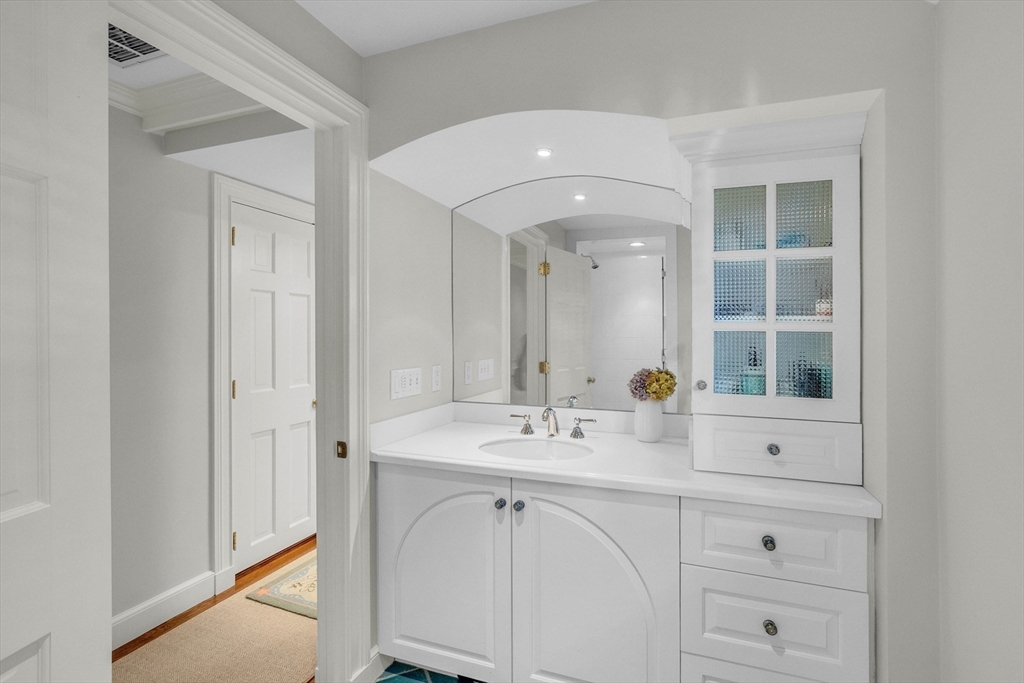15 Rockridge Road Wellesley, MA 02481 - Photo 26 of 36 a bathroom with a sink vanity and mirror