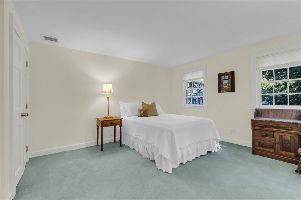 15 Rockridge Road Wellesley, MA 02481 - Photo 27 of 36 a bedroom with a bed and a furniture