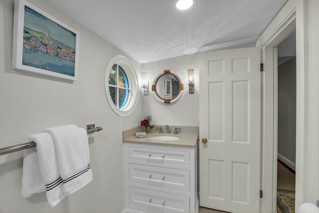 15 Rockridge Road Wellesley, MA 02481 - Photo 29 of 36 a bathroom with a sink and a mirror