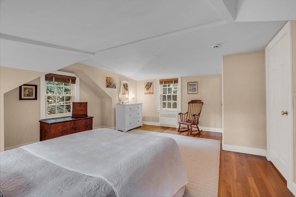 15 Rockridge Road Wellesley, MA 02481 - Photo 31 of 36 a bedroom with a bed and wooden floor