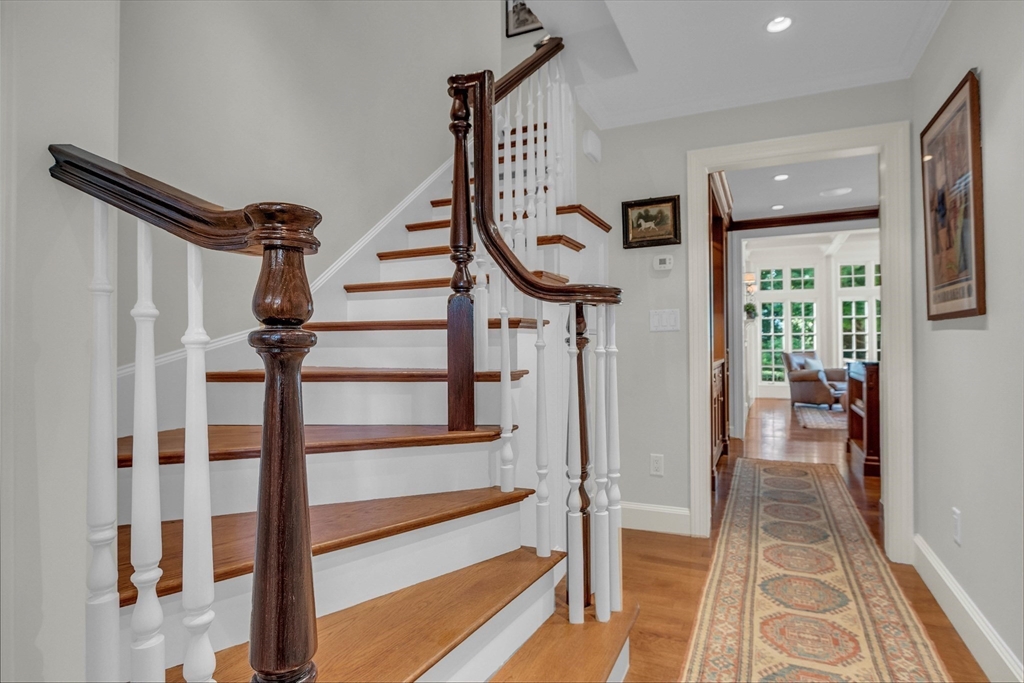 15 Rockridge Road Wellesley, MA 02481 - Photo 32 of 36 a view of entryway with wooden floor and stairs