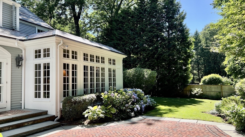 15 Rockridge Road Wellesley, MA 02481 - Photo 35 of 36 a view of a house with backyard and sitting area