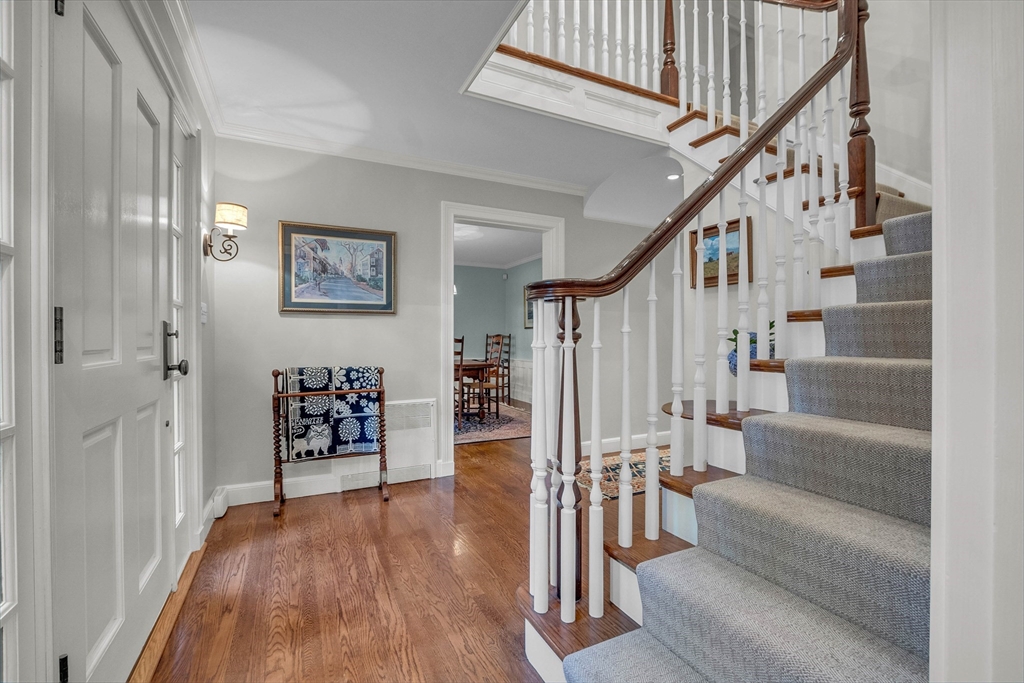 15 Rockridge Road Wellesley, MA 02481 - Photo 4 of 36 a view of entryway and hall with wooden floor