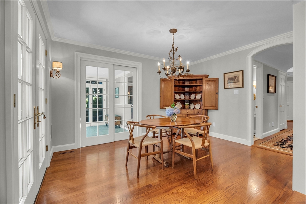 15 Rockridge Road Wellesley, MA 02481 - Photo 10 of 36 a view of a dining room with furniture window and wooden floor