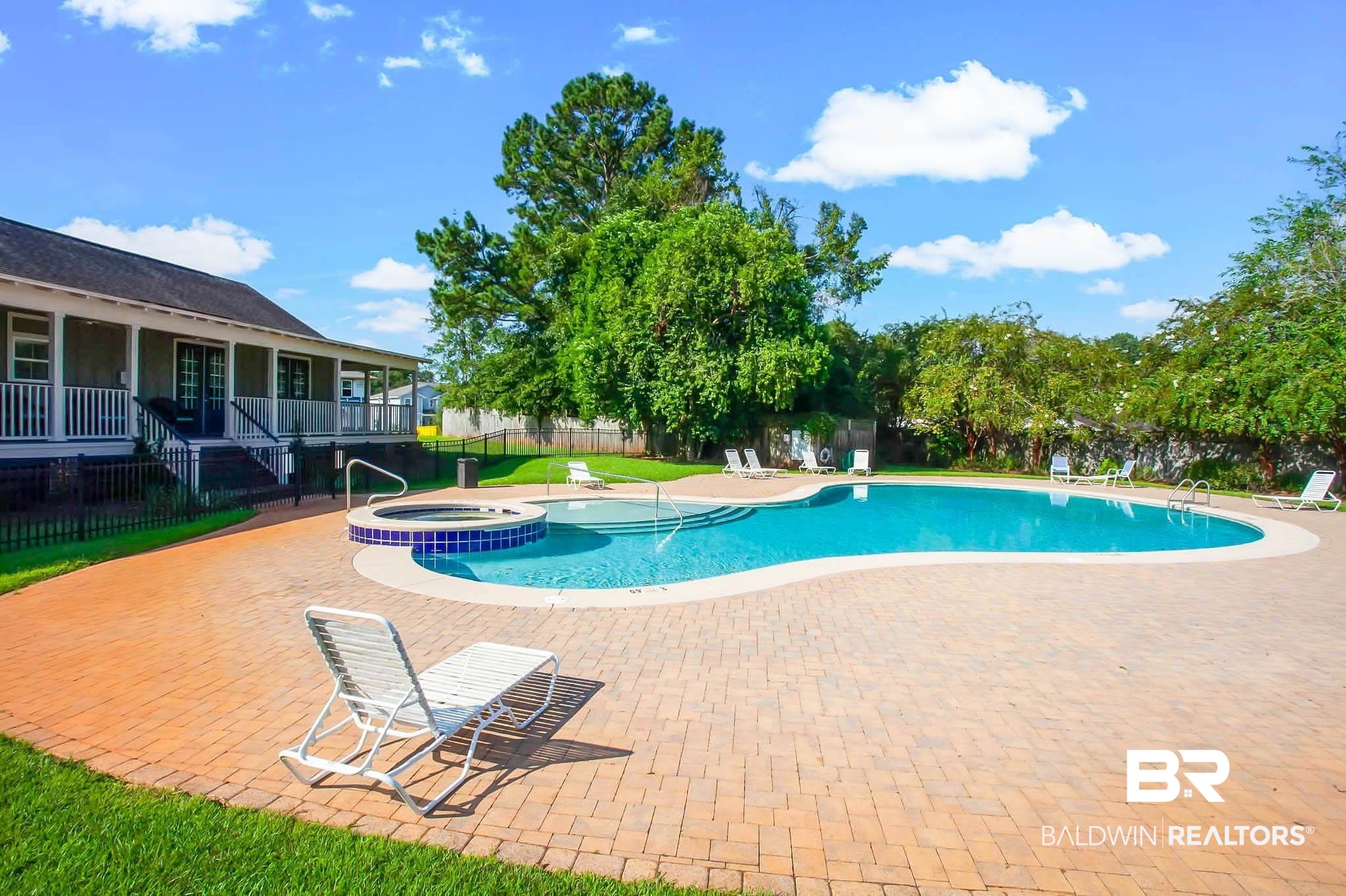 25806 Pollard Road, Unit 24 Daphne, AL 36526 - Photo 27 of 33 View of pool with a patio area and a pool with connected hot tub
