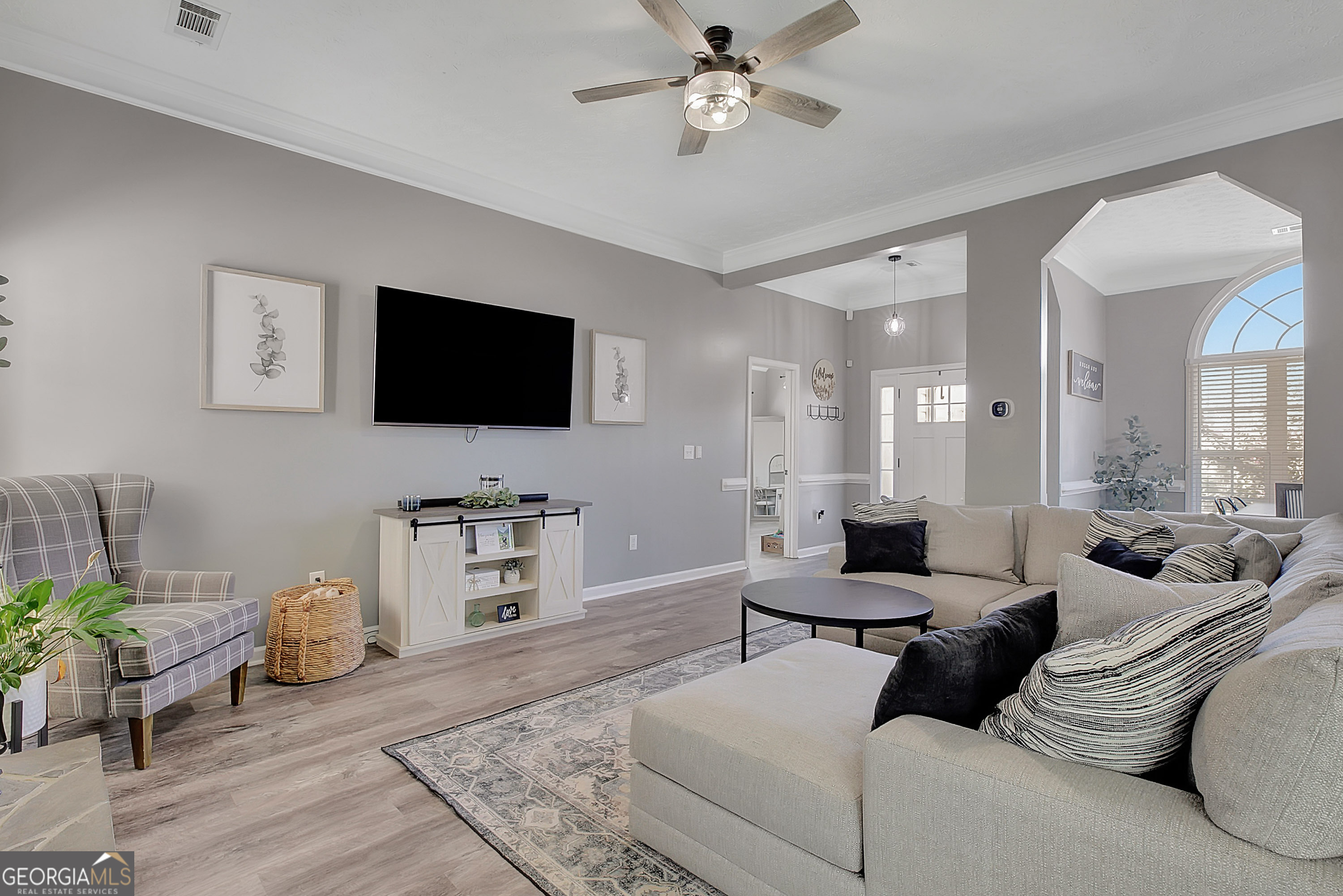 229 John Lovelace Road LaGrange, GA 30241 - Photo 21 of 59 a living room with furniture and a flat screen tv