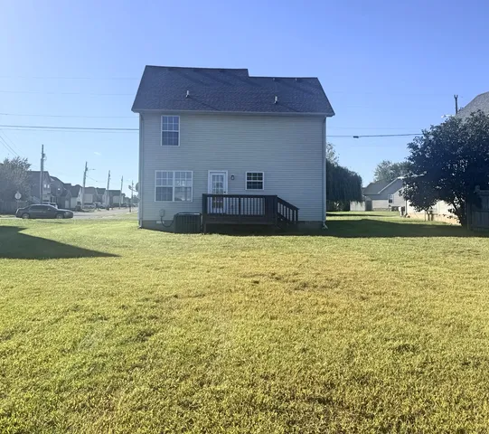 a view of a house with a big yard
