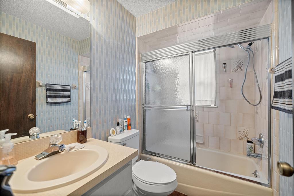 761 South Jeanne Avenue Inverness, FL 34453 - Photo 18 of 33 a bathroom with a sink toilet and shower