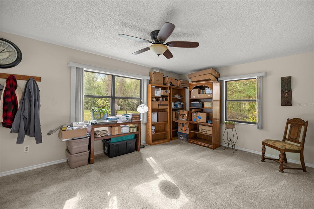 761 South Jeanne Avenue Inverness, FL 34453 - Photo 19 of 33 a view of a livingroom with furniture and a window