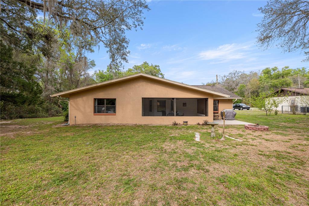 761 South Jeanne Avenue Inverness, FL 34453 - Photo 26 of 33 a house view with a garden space