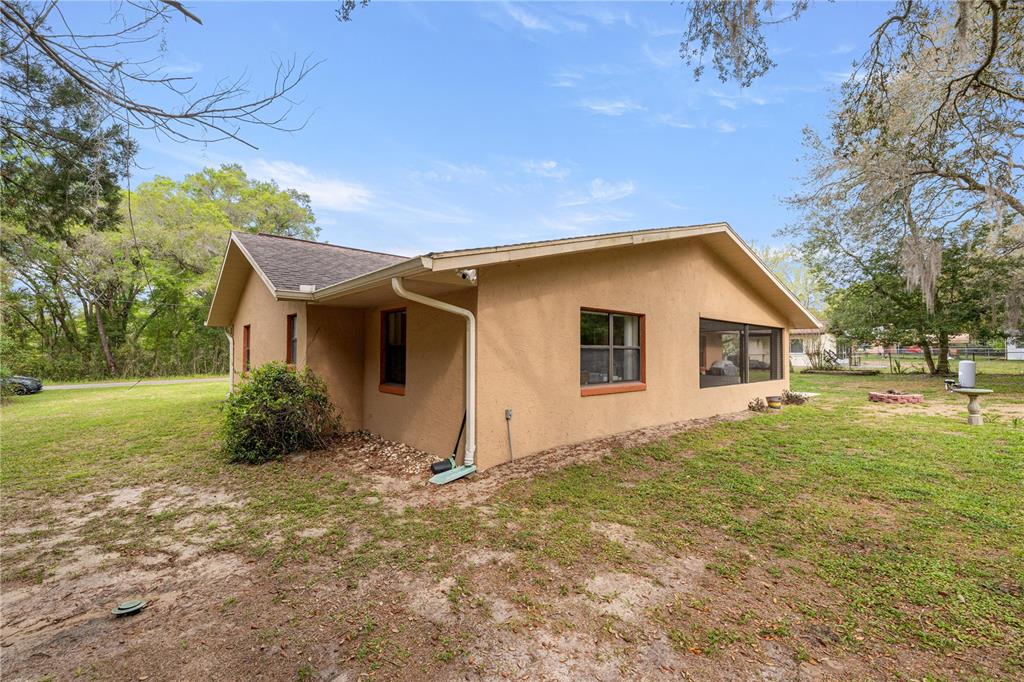 761 South Jeanne Avenue Inverness, FL 34453 - Photo 27 of 33 a view of a house with a yard