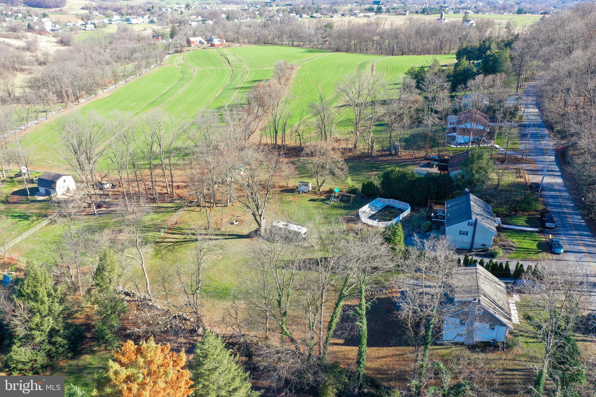 540 Blue Lake Road Denver, PA 17517 - Photo 34 of 63 an aerial view of a house with a yard basket ball court and outdoor seating