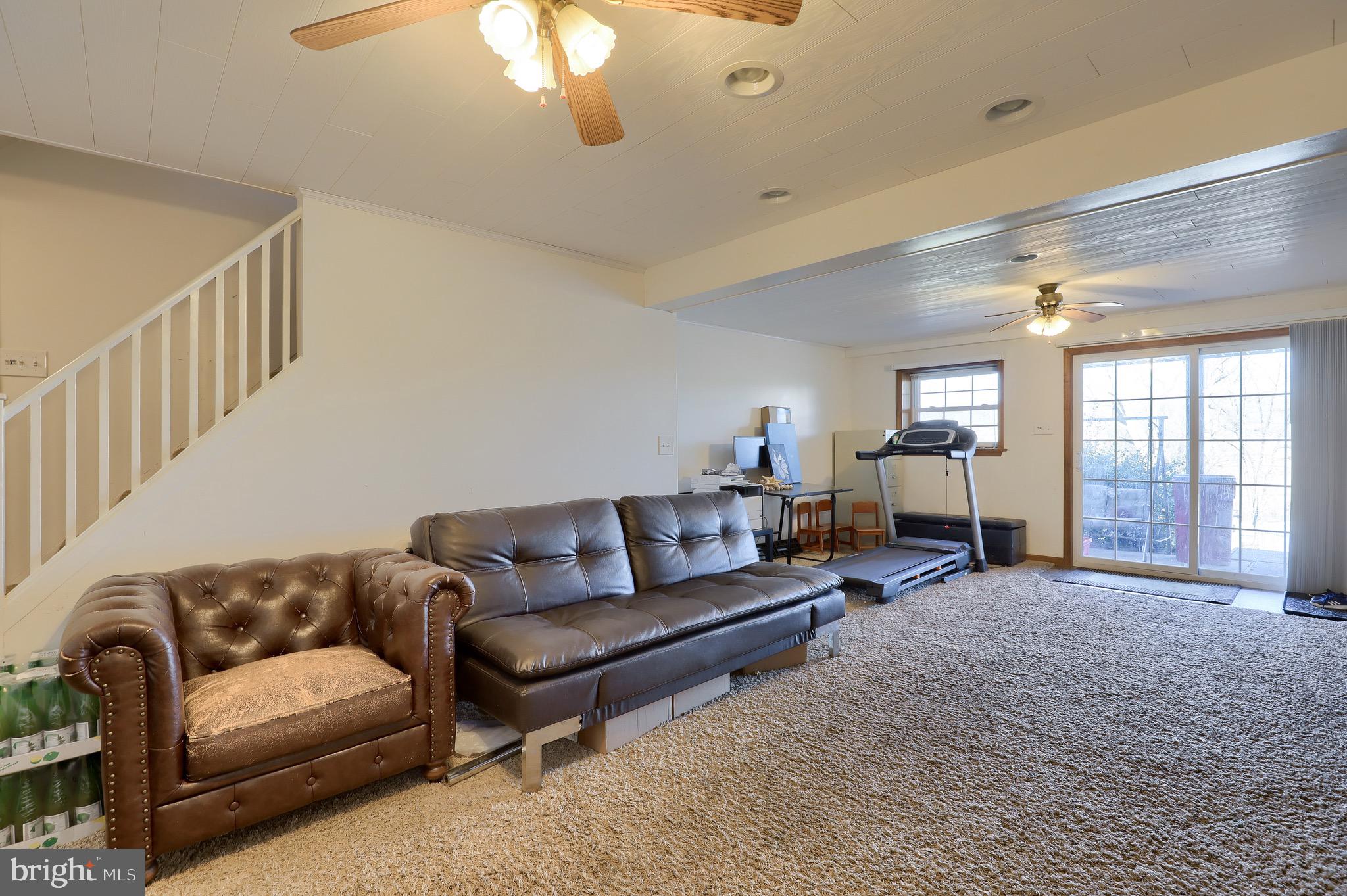 540 Blue Lake Road Denver, PA 17517 - Photo 56 of 63 a living room with furniture and a large window