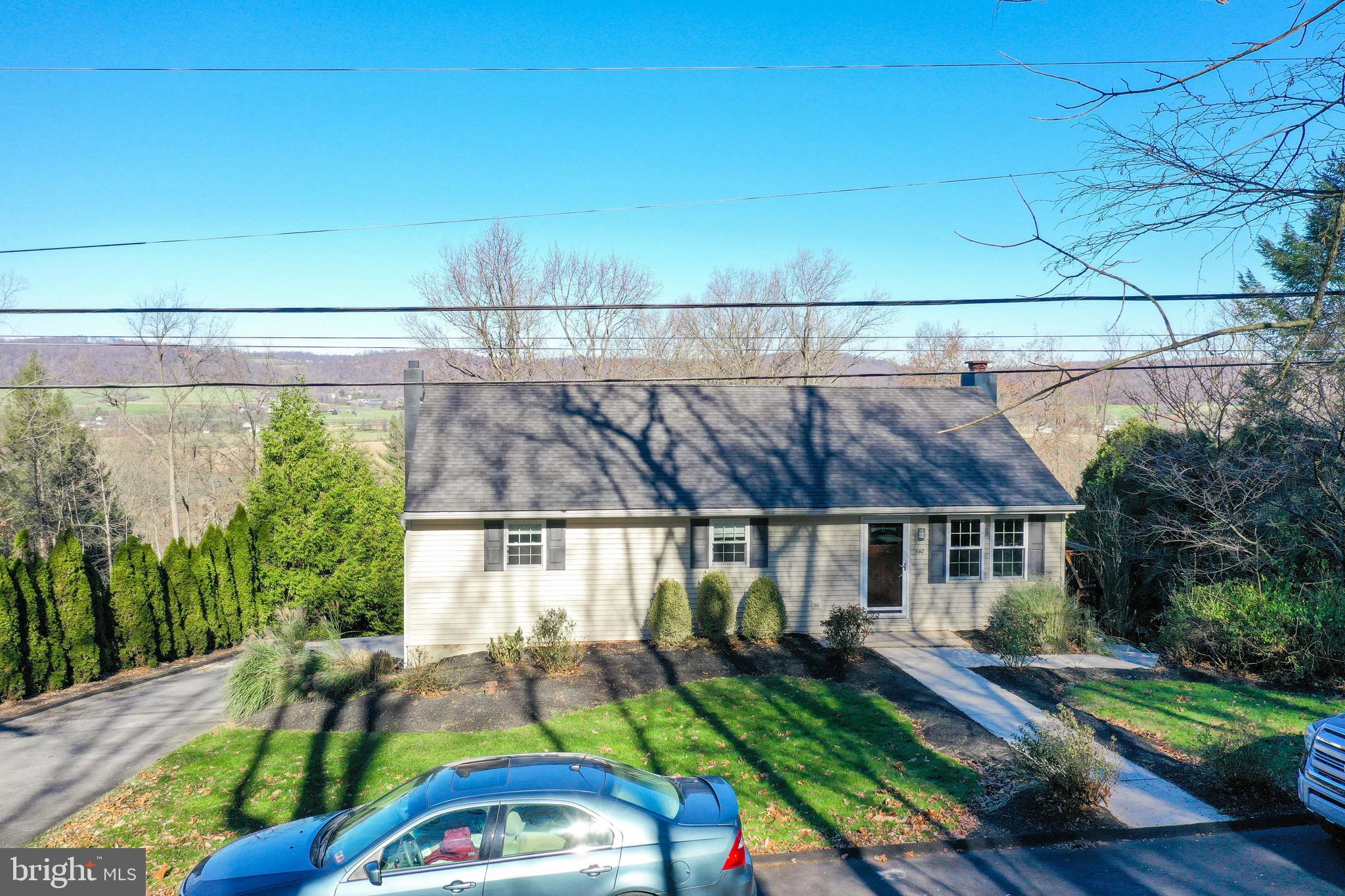540 Blue Lake Road Denver, PA 17517 - Photo 7 of 63 a front view of a house with garden