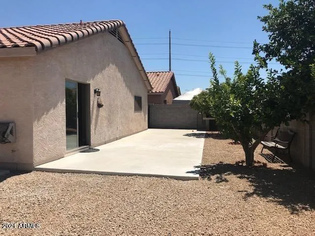 a house view with a backyard space