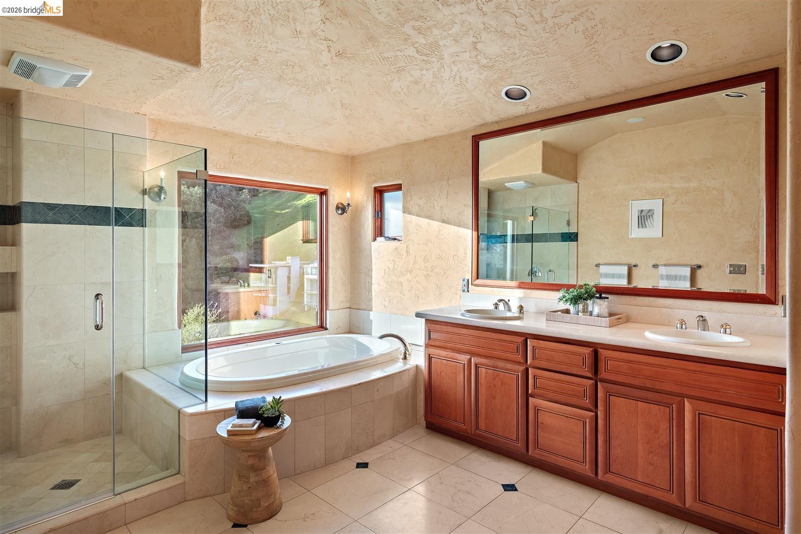 29 Live Oak Road Berkeley, CA 94705 - Photo 18 of 30 a bathroom with a tub sink shower and mirror