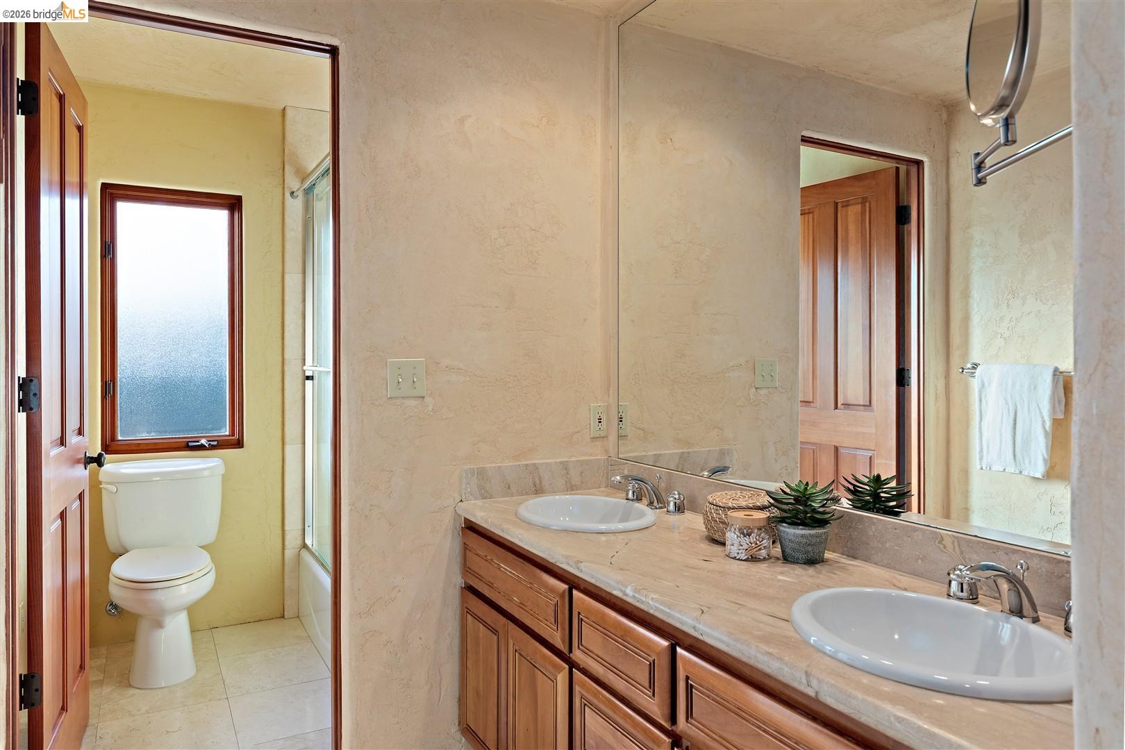 29 Live Oak Road Berkeley, CA 94705 - Photo 21 of 30 a bathroom with a granite countertop sink toilet and shower