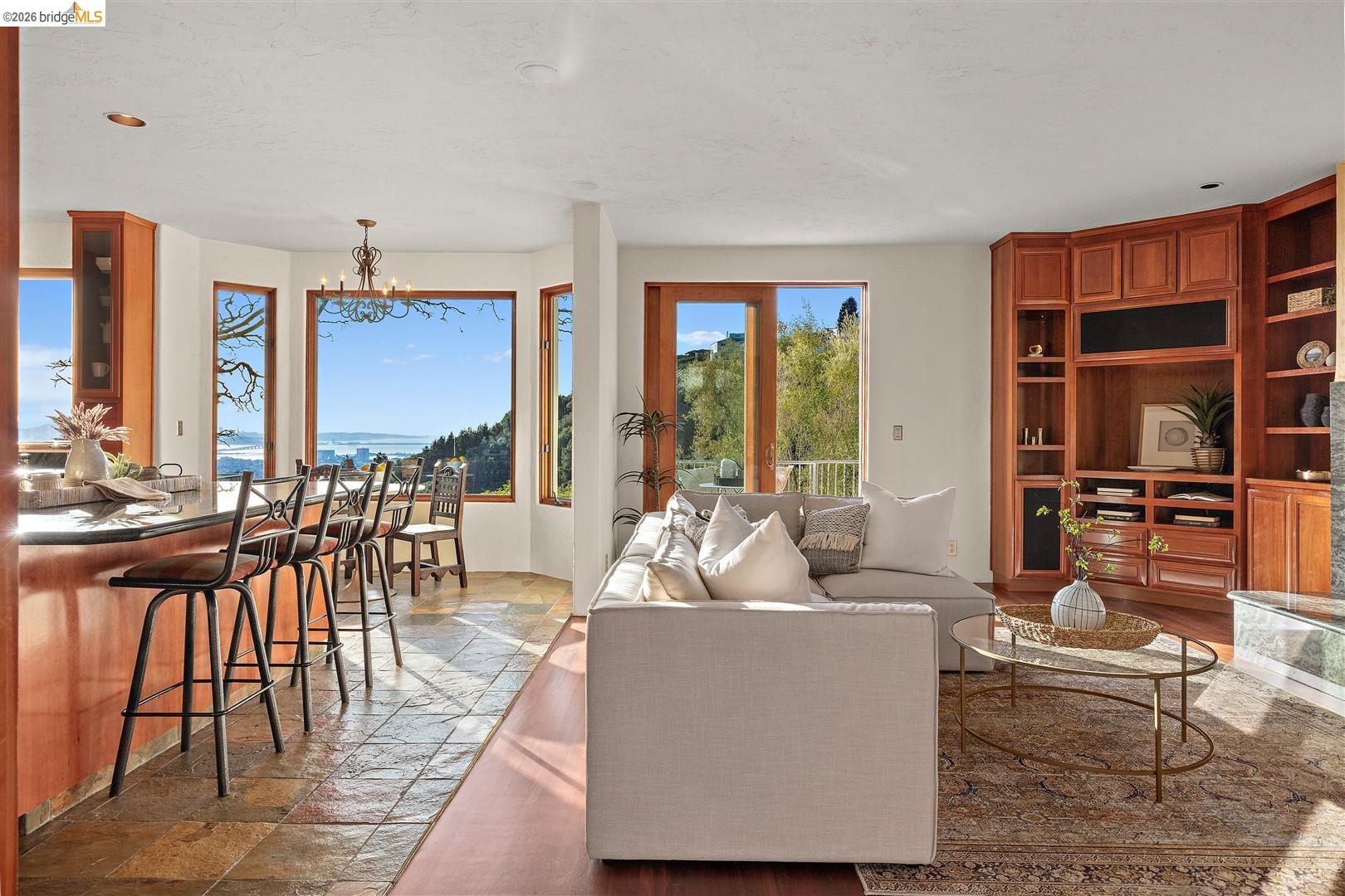 29 Live Oak Road Berkeley, CA 94705 - Photo 10 of 30 a living room with furniture and large windows