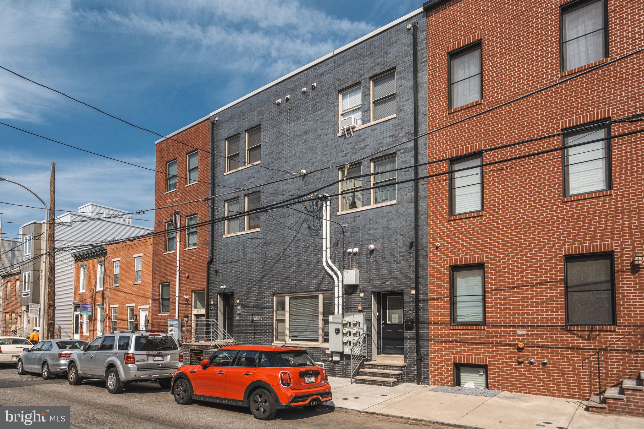 2609 Federal Street, Unit D Philadelphia, PA 19146 - Photo 5 of 27 a car parked in front of a building