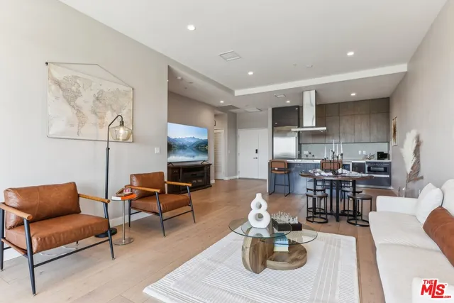 a kitchen with a sink stove and refrigerator