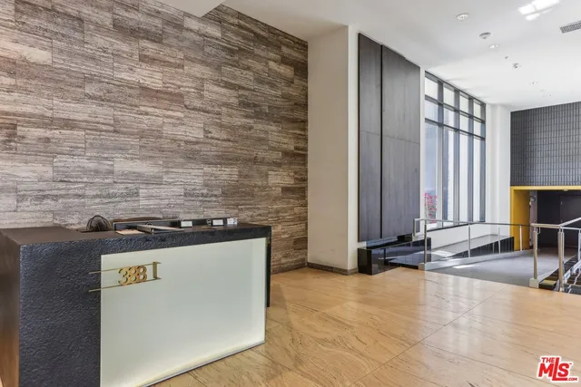 a bathroom with a glass door shower