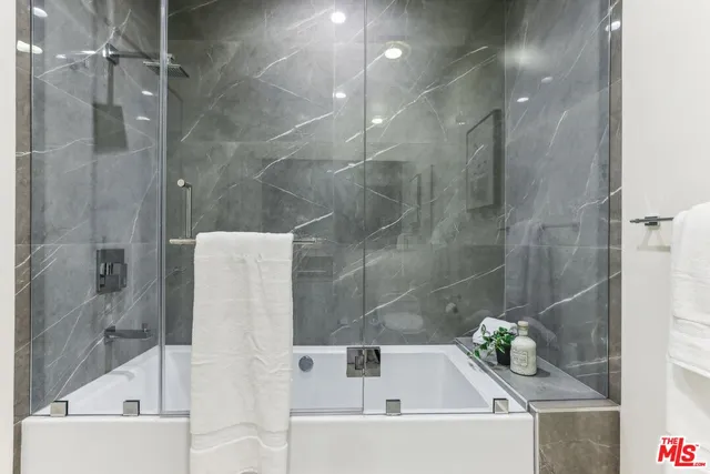 a front view of house with yard barbeque oven and outdoor seating