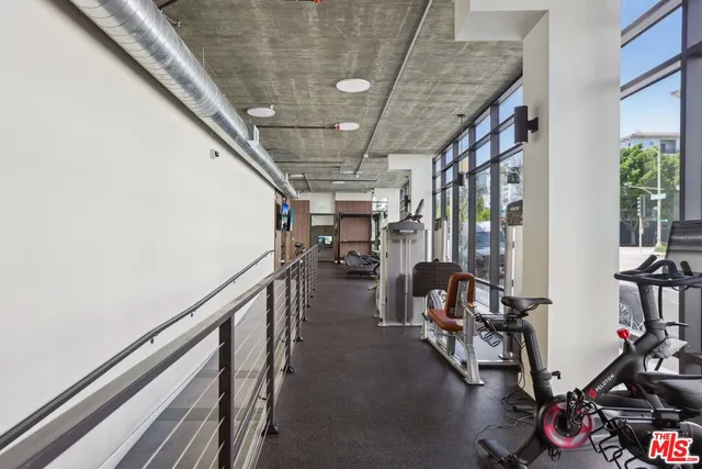 a view of multiple houses with a yard