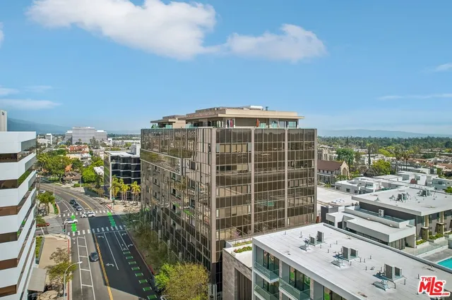 a view of a building with a street