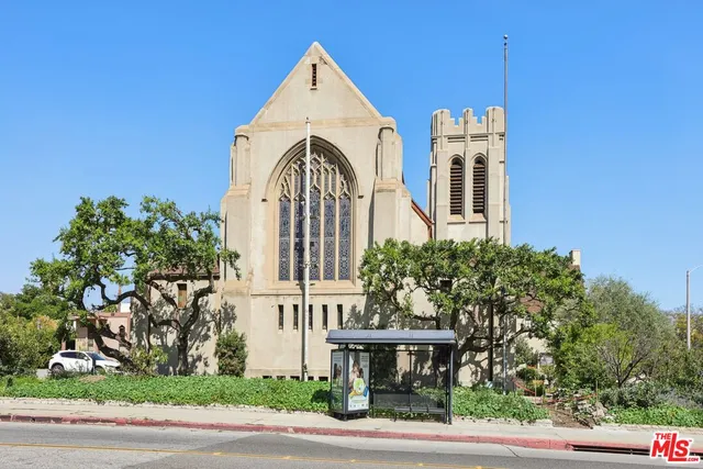 a view of a building along the street