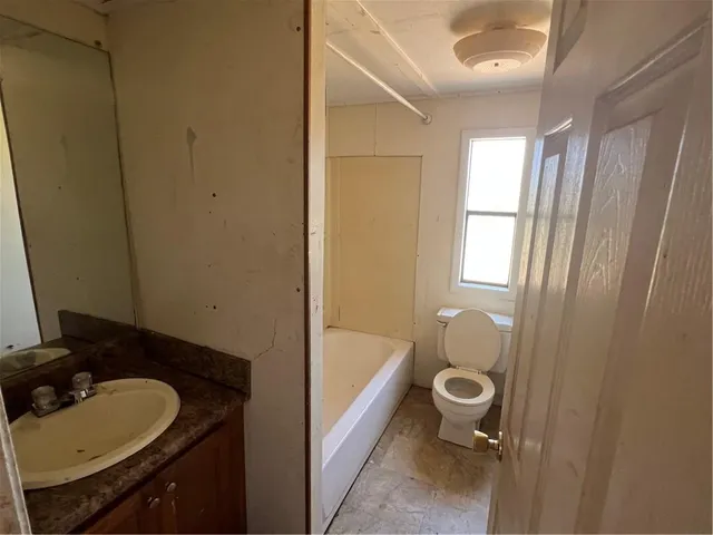 a bathroom with a sink and a tub