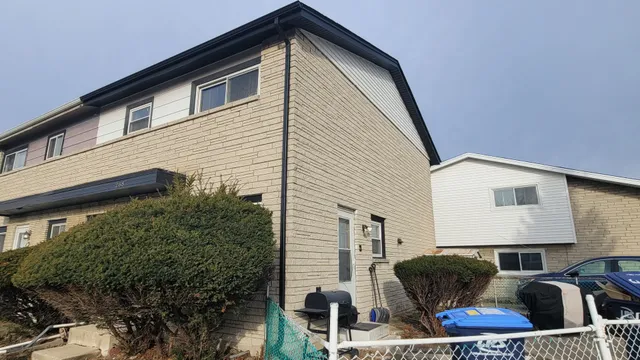 a front view of a house with patio