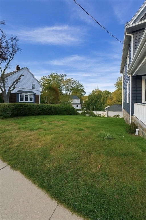 145 Lagrange Street, Unit 2 Boston, MA 02132 - Photo 14 of 17 a view of a yard in front of a house