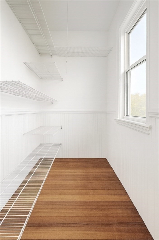 145 Lagrange Street, Unit 2 Boston, MA 02132 - Photo 9 of 17 a view of a room with wooden floor and windows
