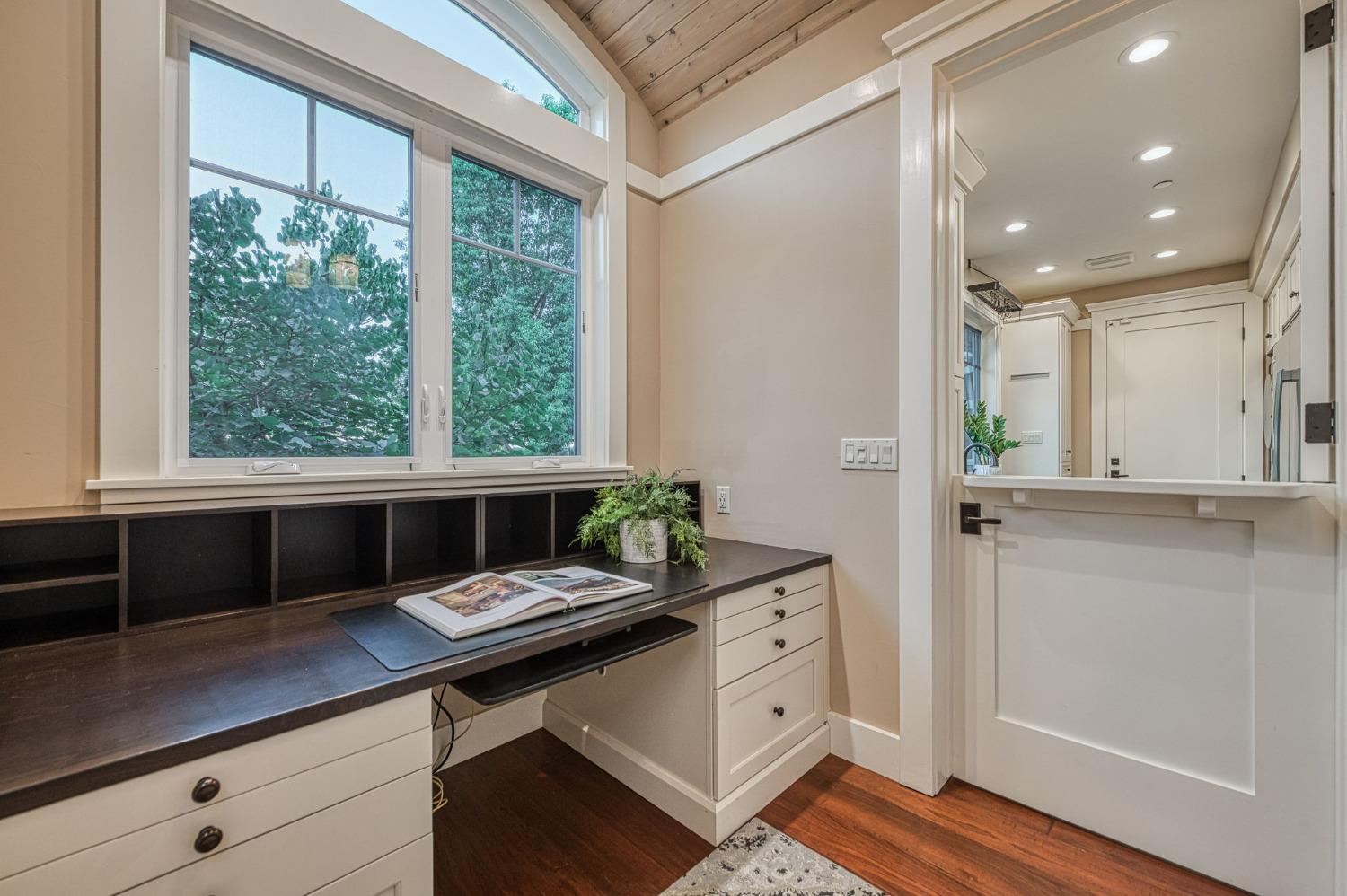 1098 South Rainbow Route Sanger, CA 93657 - Photo 17 of 70 a view of a double vanity sink and a window in a room