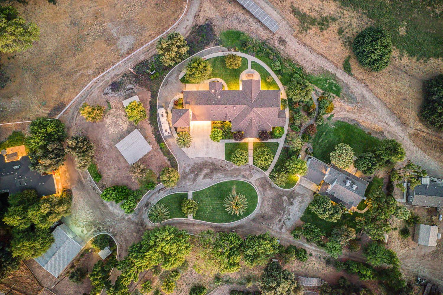 1098 South Rainbow Route Sanger, CA 93657 - Photo 2 of 70 an aerial view of a house with a yard and swimming pool