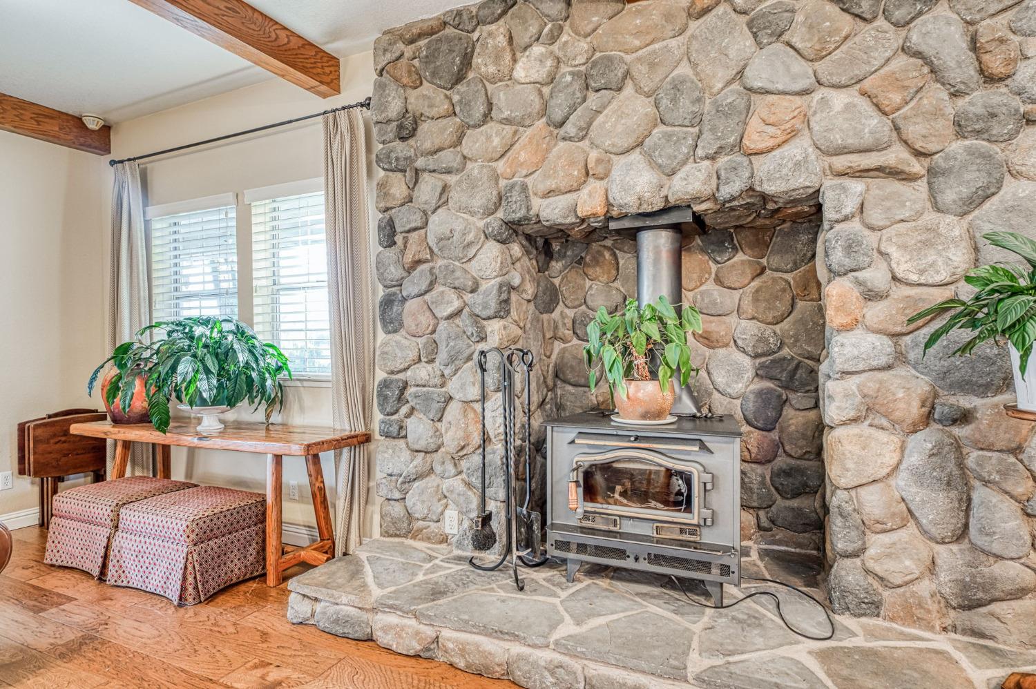 1098 South Rainbow Route Sanger, CA 93657 - Photo 38 of 70 a living room with furniture and a fireplace