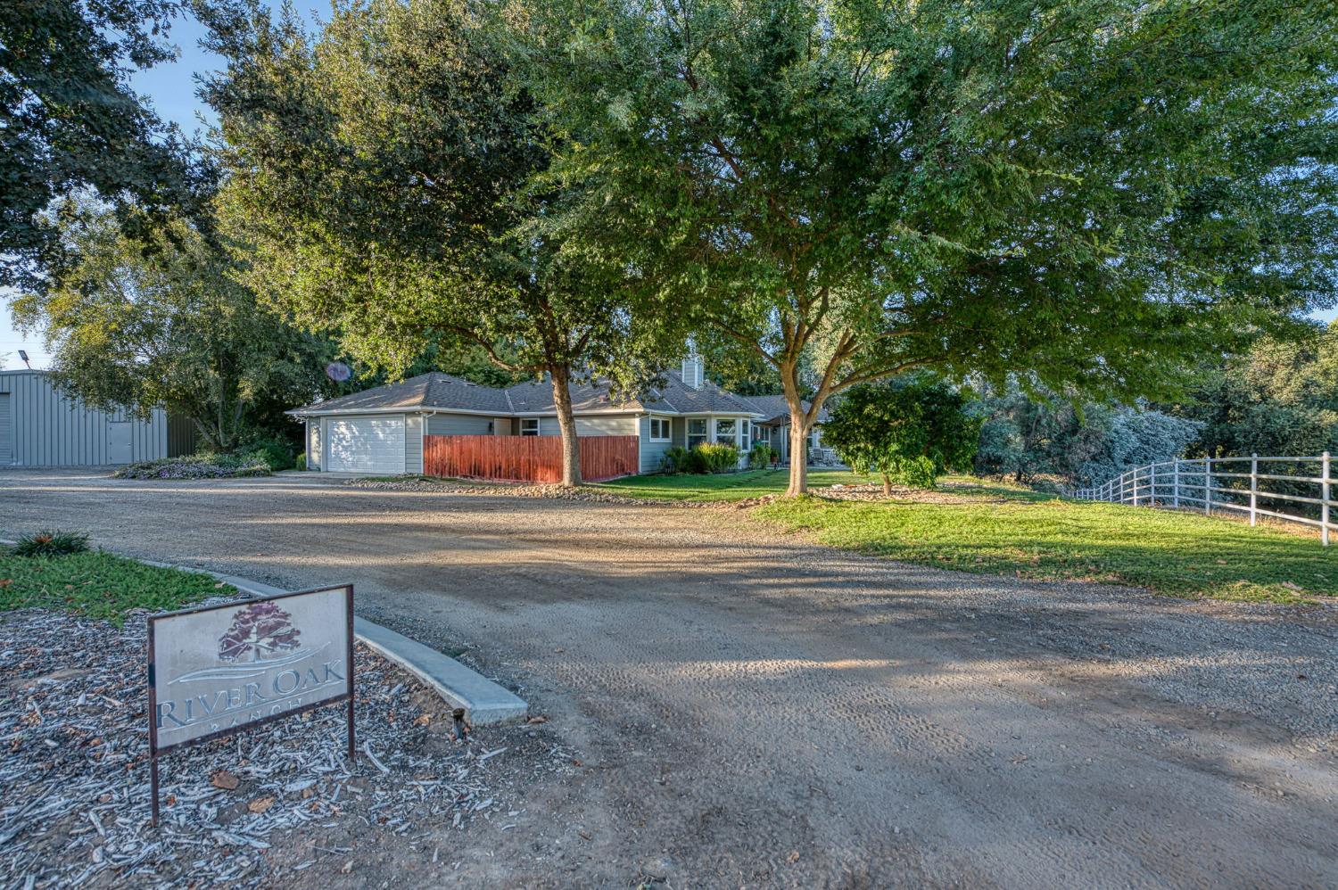 1098 South Rainbow Route Sanger, CA 93657 - Photo 50 of 70 a view of a house with a yard and sitting area