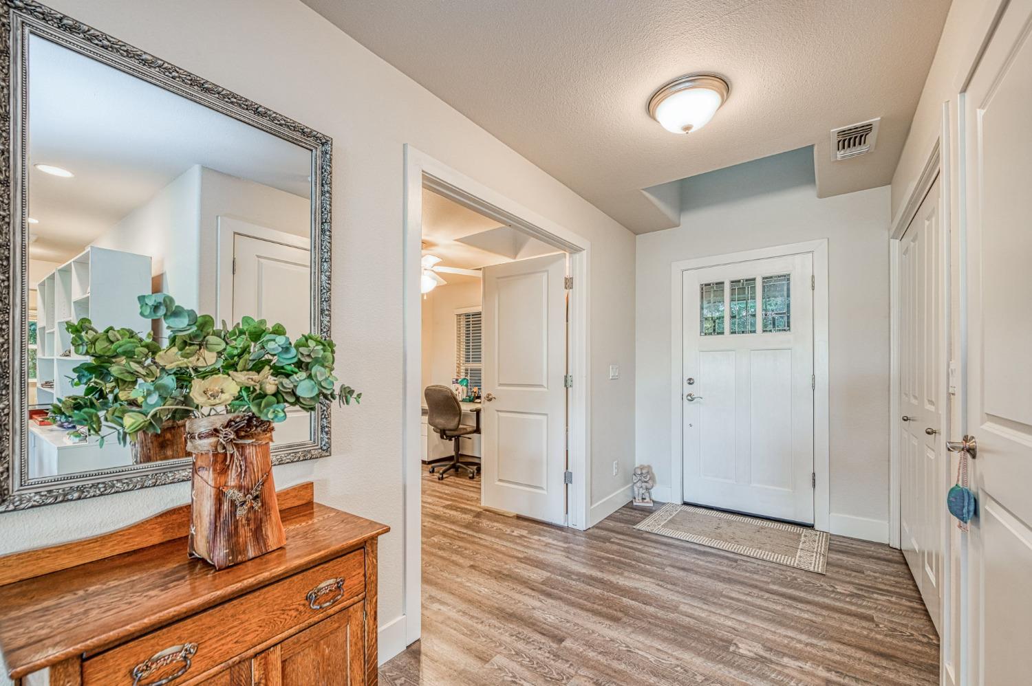 1098 South Rainbow Route Sanger, CA 93657 - Photo 53 of 70 a view of an entryway of house and wooden floor