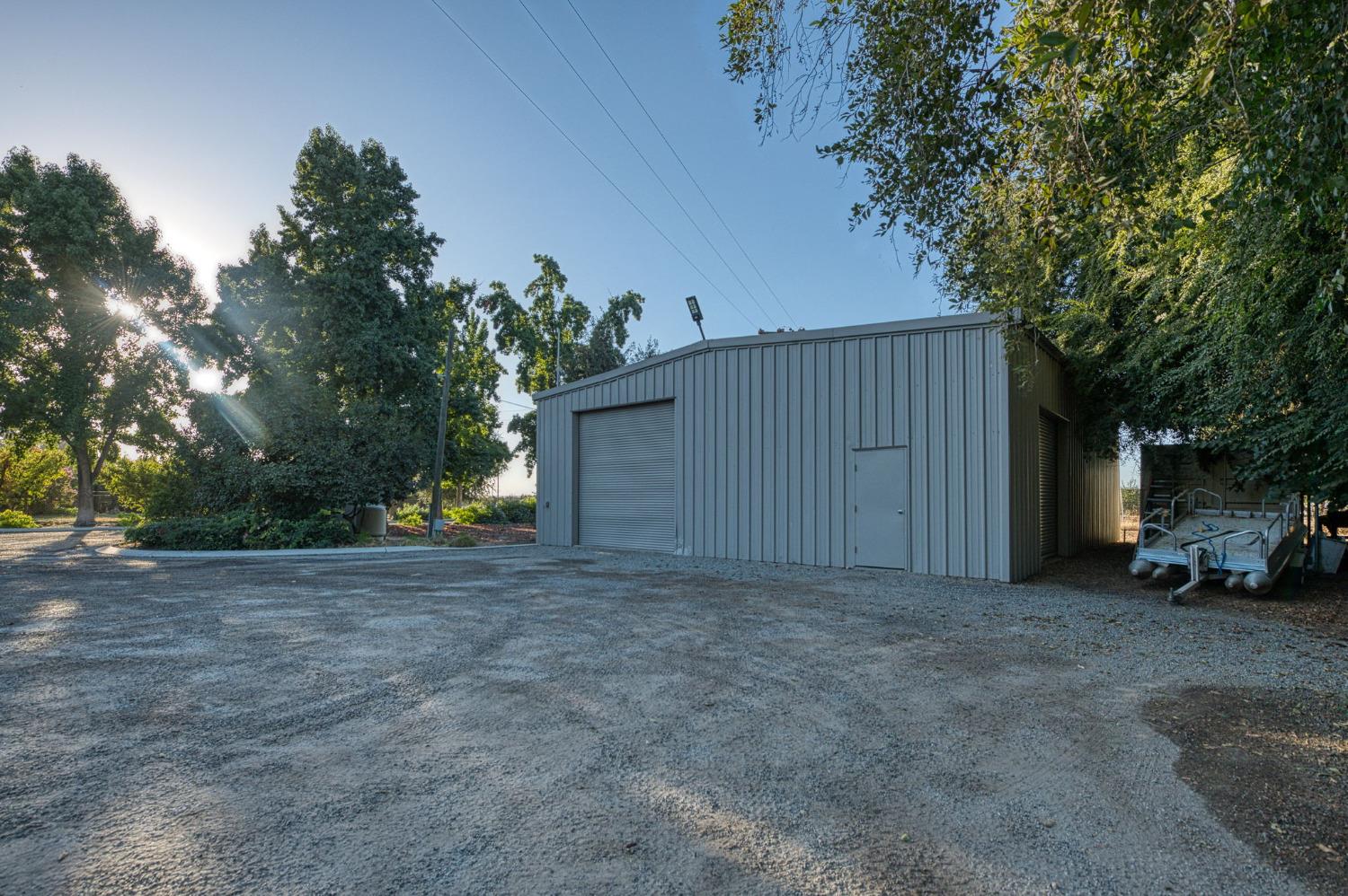 1098 South Rainbow Route Sanger, CA 93657 - Photo 62 of 70 40 X 50 Metal Shop with 2 roll up doors and pedestrian door.