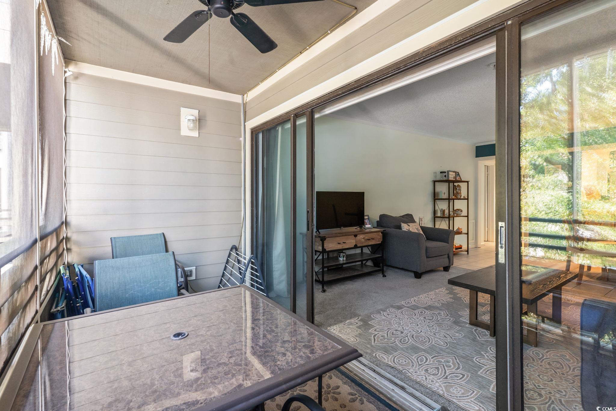 415 Ocean Creek Drive, Unit 2343 Myrtle Beach, SC 29572 - Photo 24 of 36 Sunroom / solarium featuring a ceiling fan