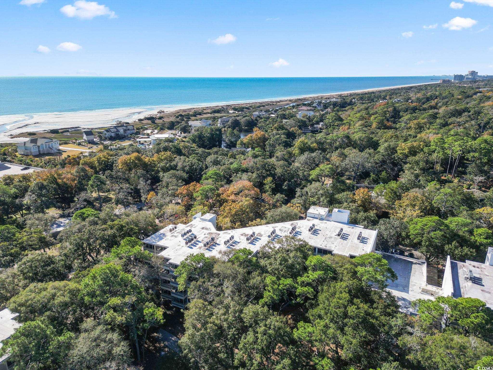 415 Ocean Creek Drive, Unit 2343 Myrtle Beach, SC 29572 - Photo 31 of 36 View of urban area featuring a tree filled landscape and a large body of water