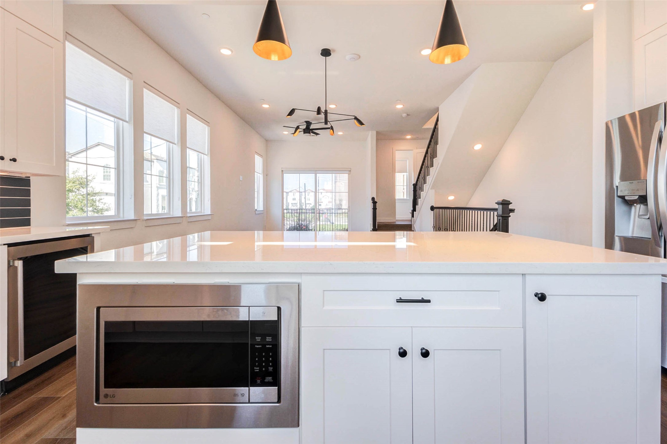 2751 Freund Street Houston, TX 77003 - Photo 14 of 34 a kitchen with a stove and a white cabinets