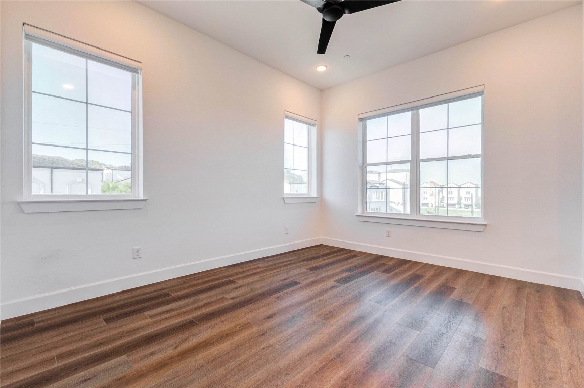 2751 Freund Street Houston, TX 77003 - Photo 24 of 34 a view of an empty room with wooden floor and a window